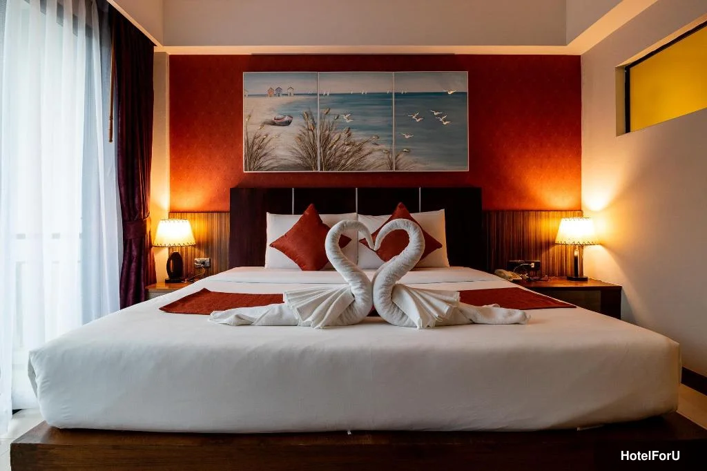 Di Pantai Boutique Beach Resort - Deluxe Pool View Room - Bed